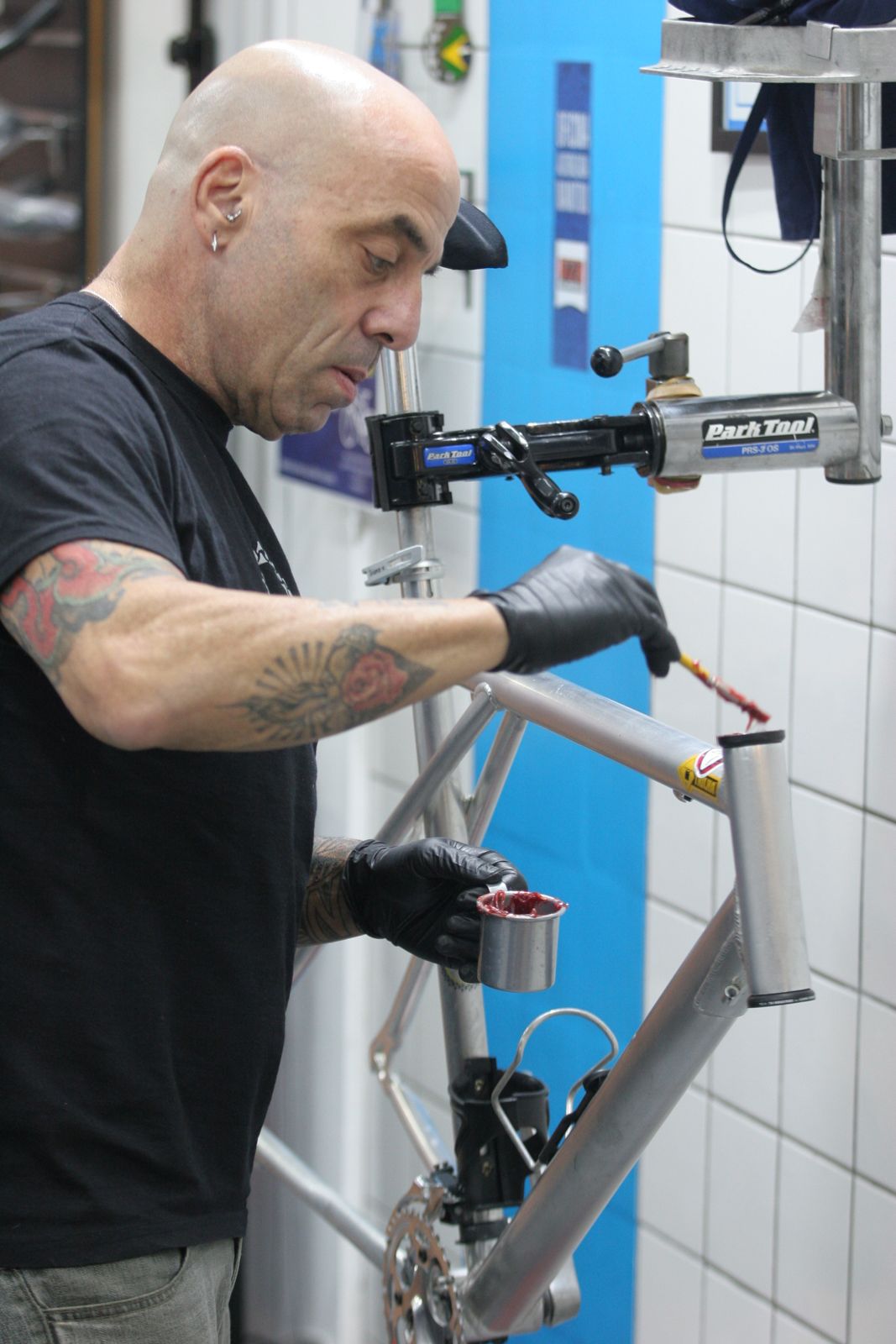 Marc adjusting a bike on the repair stand