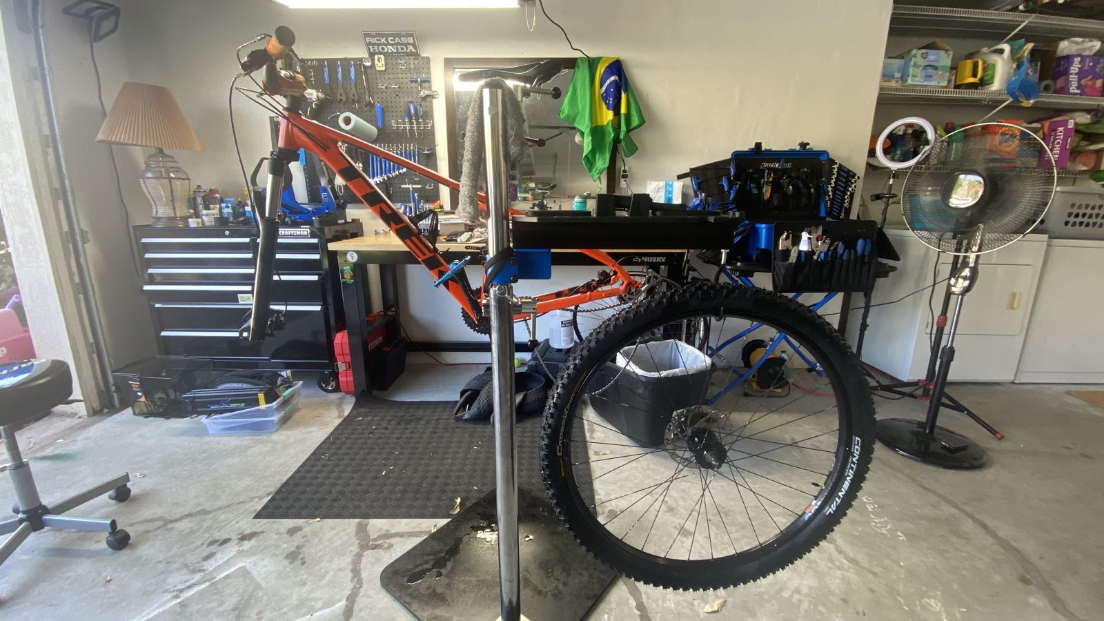 Mountain bike tune-up in a home garage